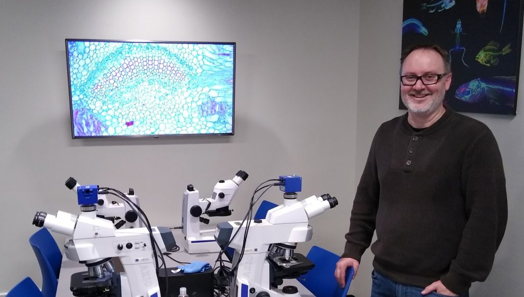 Dr. Glen Marrs in his microscopy teaching facility, Wake Forest University (USA)